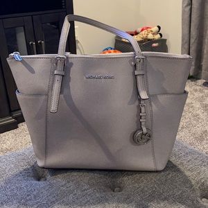 Grey Michael Kors over the shoulder purse